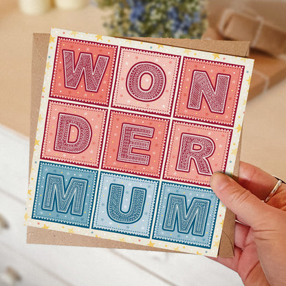 red and blue wonder mum superhero mother's day card with kraft brown envelope