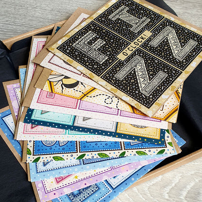 mystery box containing 10 unique  typographic greeting cards from Jess A Little Creative