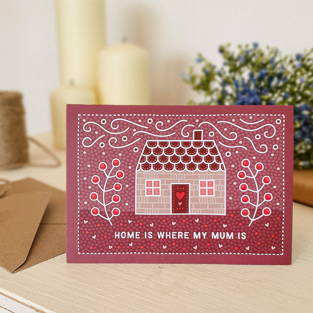 cute pink mother's day card featuring cute house illustration and 'home is where my mum is' message. Supplied with a recycled kraft brown envelope