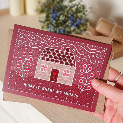 cute and homely mother's day card featuring pink cottage illustration in folk-art style. Supplied with a recycled kraft brown envelope.