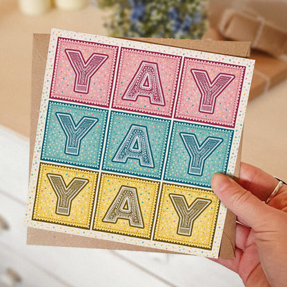 pink blue and yellow yay congratulations card supplied with kraft brown recycled envelope