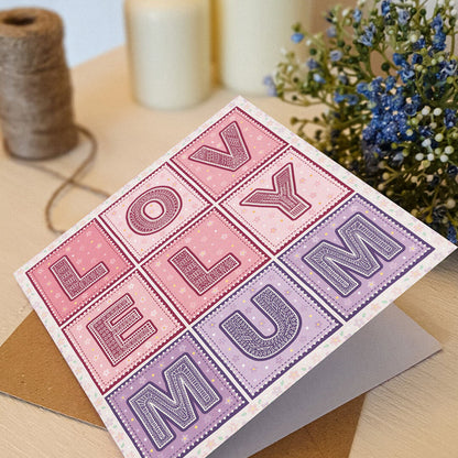 pink and lilac lovely mum typographic mother's day card with recycled kraft brown envelope