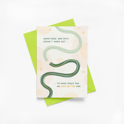 Greeting card for friend with green wavy line design and green envelope on a white background