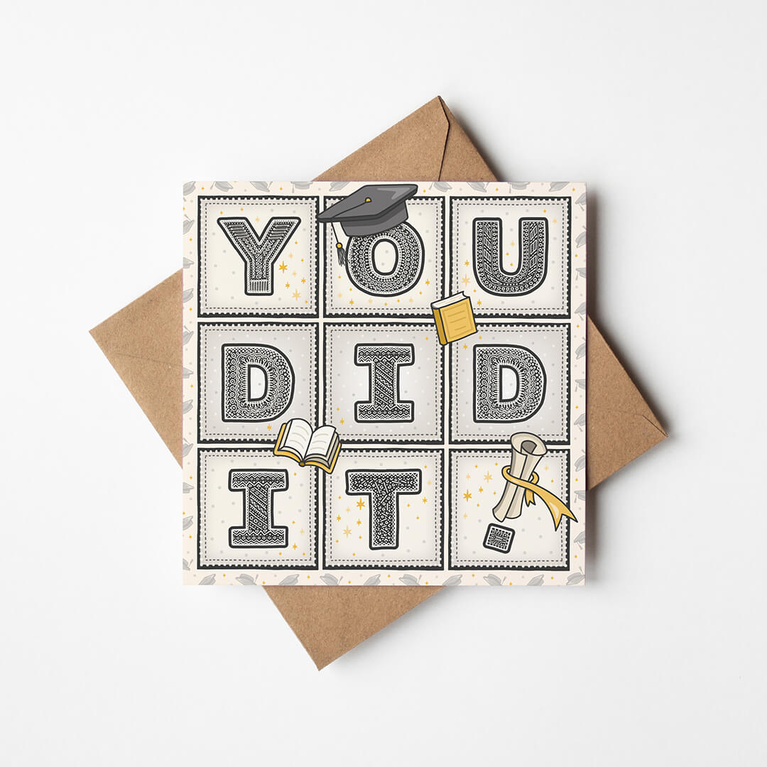 unique typographic graduation card with 'you did it!' message and a kraft brown recycled envelope on a white background