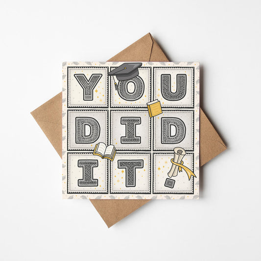 unique typographic graduation card with 'you did it!' message and a kraft brown recycled envelope on a white background